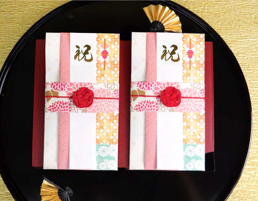 えっ？ご祝儀袋！？ユーモアたっぷりの【顔合わせしおり】