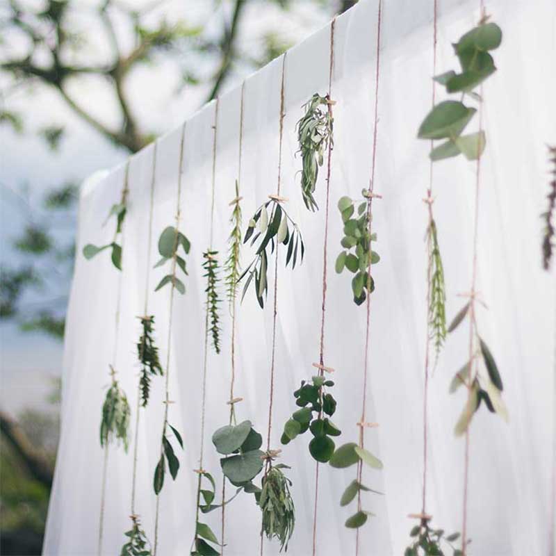 Beautiful white decorated wedding arch