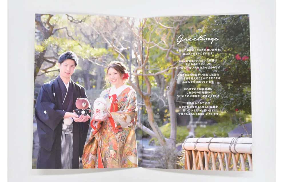 写真を前面に見開き断ち切りで使用したプロフィールブック実例